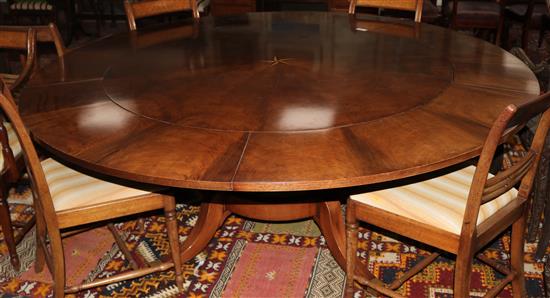 A fine reproduction mahogany Capstan dining table, 183cms extended